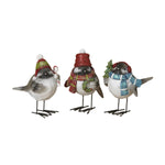 Three resin and metal holiday winter birds wearing festive clothing, including hats and scarves, on a white background. Available at Be Charmed
