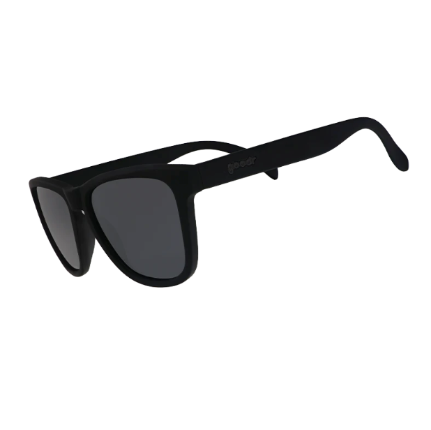 A pair of black Goodr sunglasses with a simple, wayfarer-style design. Available at Be Charmed