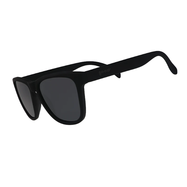 A pair of black Goodr sunglasses with a simple, wayfarer-style design. Available at Be Charmed