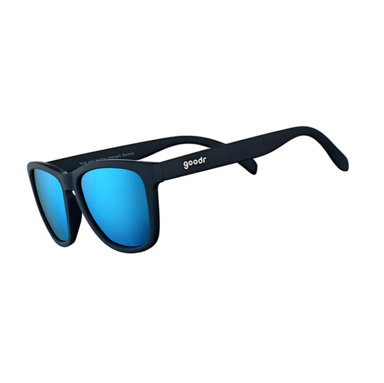 Goodr Mick & Keith's Midnight Ramble Sunglasses featuring classic black frames and blue smoke-tinted polarized lenses, designed for high-energy adventures and effortless cool, available at Be Charmed