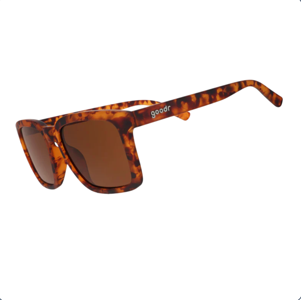 Goodr Sunglasses with tortoiseshell frame and brown lenses on a white background. Available at Be Charmed