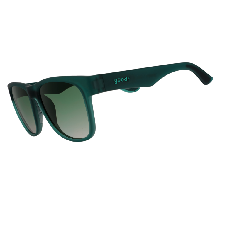 Goodr Underwater Thunder Plunder Sunglasses featuring vibrant transparent teal frames and green polarized lenses, built for active comfort and bold beachside flair, available at Be Charmed
