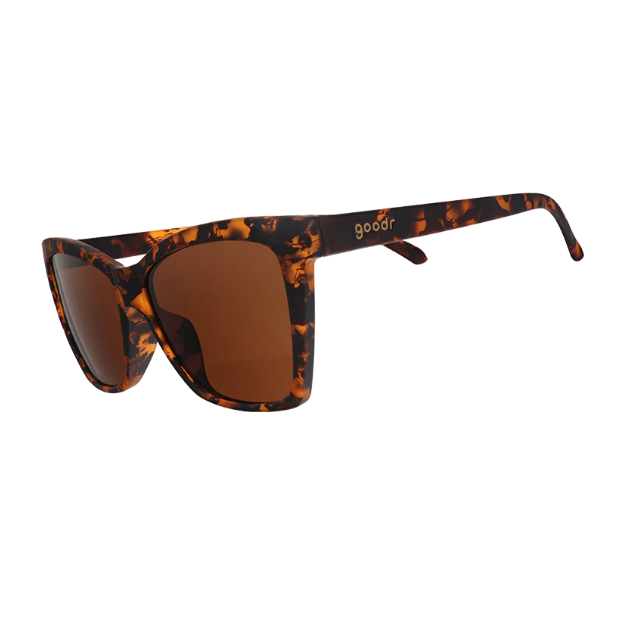 A pair of Goodr Vanguard Visionary sunglasses with a tortoiseshell pattern and brown lenses. Available at Be Charmed
