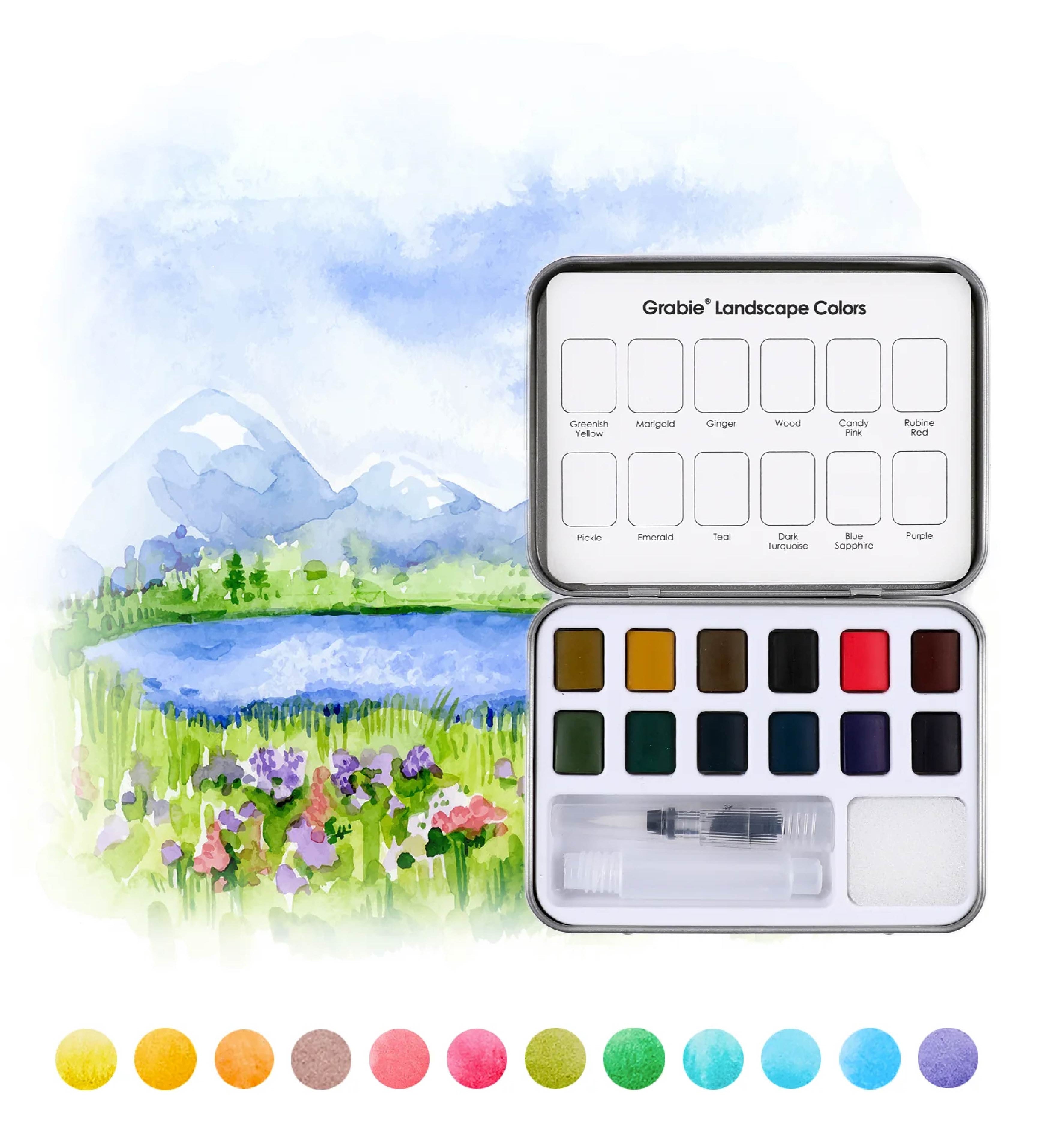Grabie Watercolor paint set with a landscape illustration on a white background. Available at Be Charmed