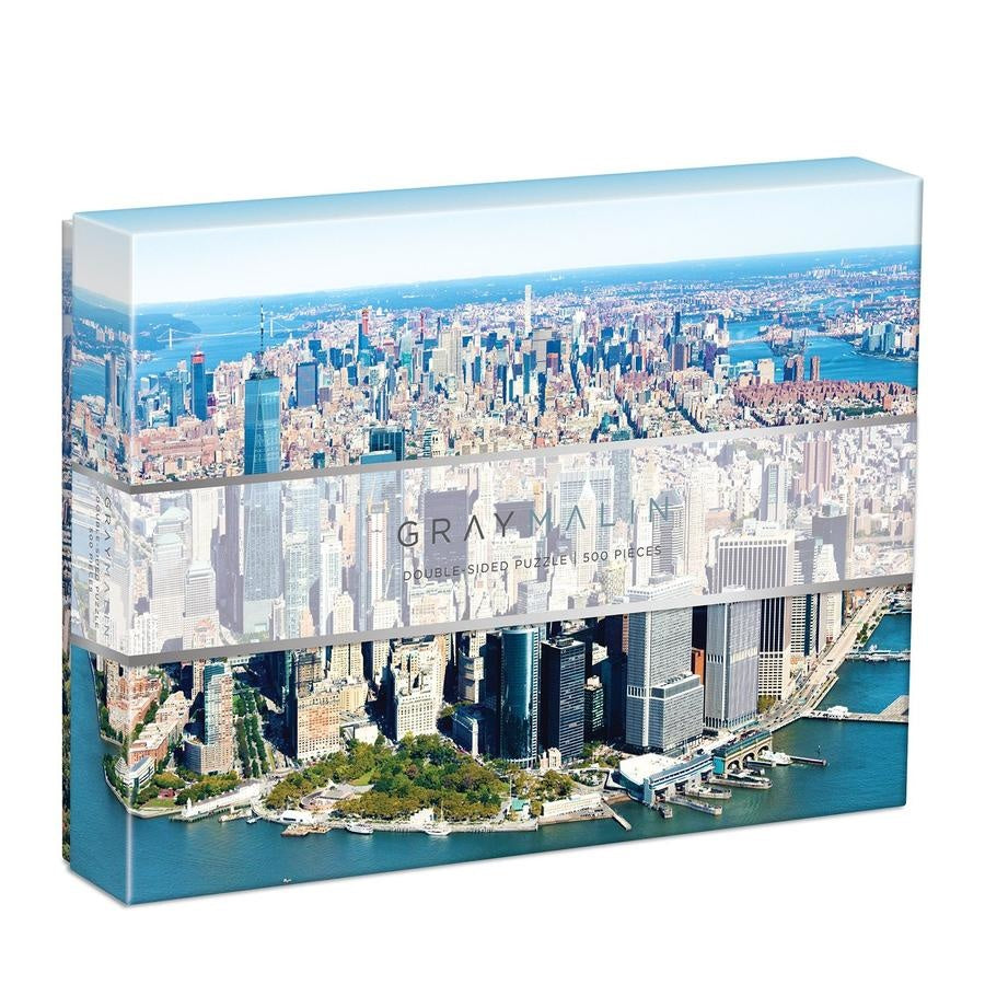 Gray Malin 500-piece double-sided NYC puzzle – premium jigsaw puzzle featuring iconic New York City imagery on both sides, one in full color and one in black and white, perfect for puzzle lovers and design fans, available at Be Charmed.