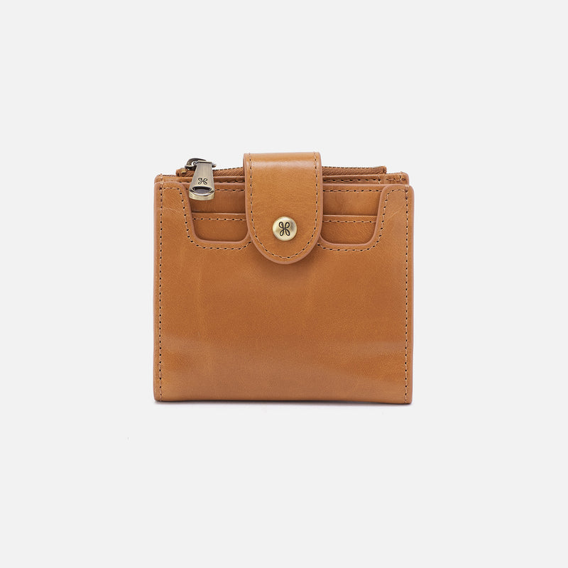 Natural leather Hobo wallet with a gold clasp on a white background. Available at Be Charmed