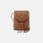 Timber Brown HOBO leather crossbody bag with gold accents on a white background. Available at Be Charmed