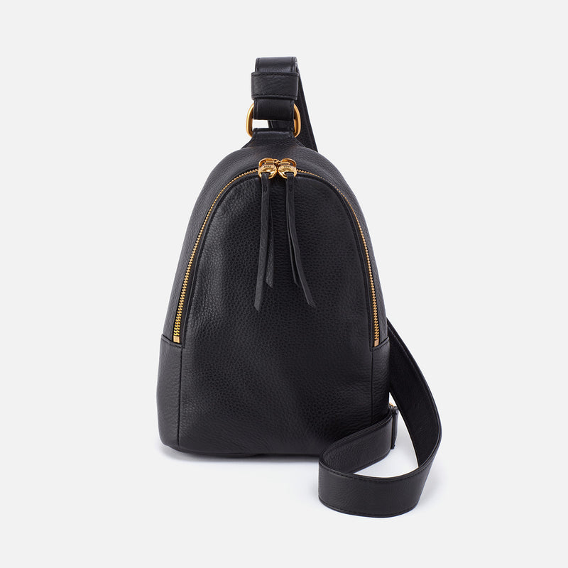 Black leather Hobo Sling bag with gold zipper on a white background. Available at Be Charmed