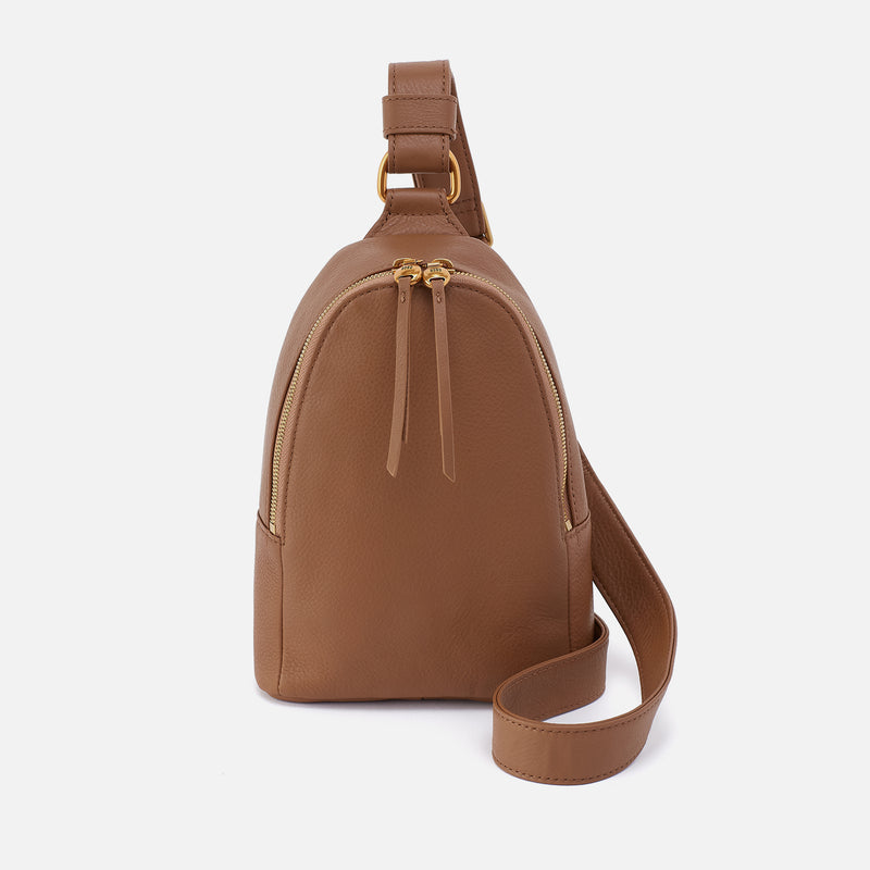 Timber Brown leather HOBO sling bag on a white background. Available at Be Charmed