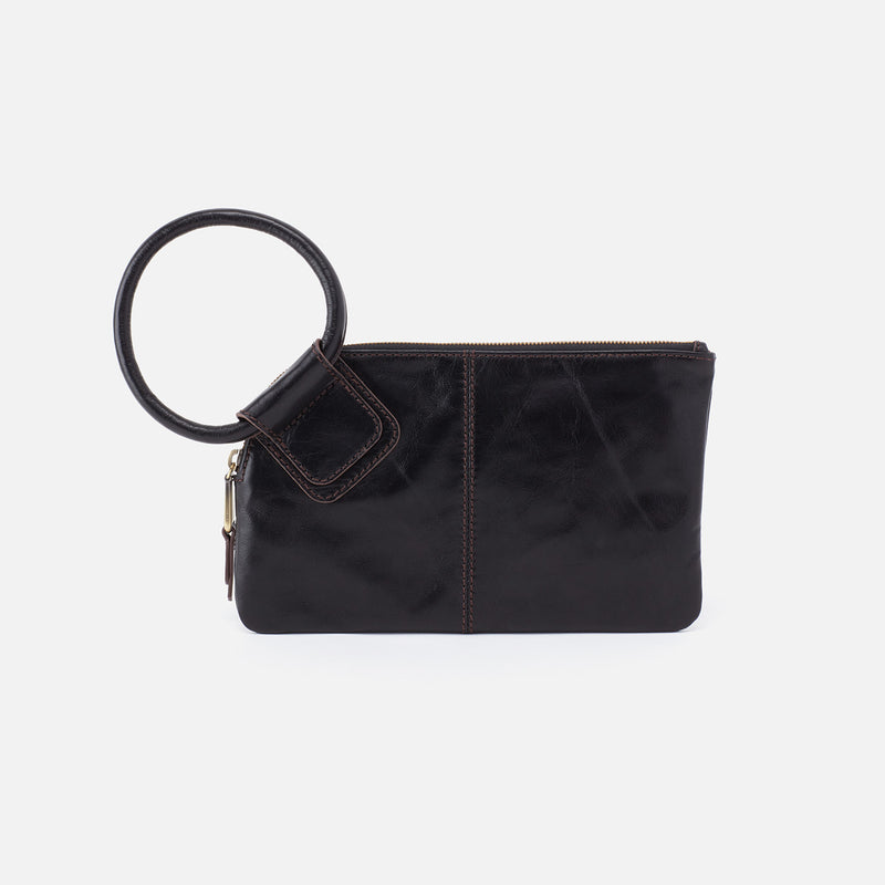 Black HOBO clutch bag with a ring handle on a white background. Availablea at Be Charmed