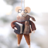 Felt mouse ornament with glasses and a scarf hanging against a blurred natural background. Available at Be Charmed