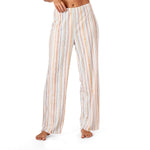 Striped pajama pants worn by a person on a white background. Available at Be Charmed