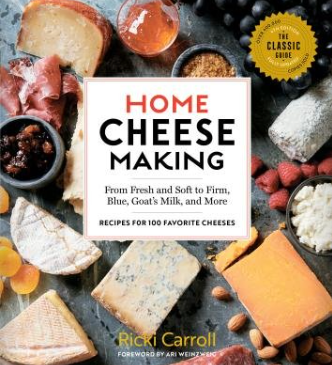 Book cover of 'Home Cheese Making' with cheese and ingredients on a dark surface. Available at Be Charmed