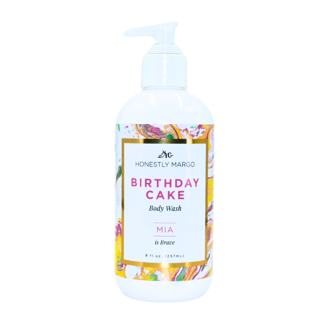 Body wash bottle labeled 'Birthday Cake' by Honestly Margo on a white background. Available at Be Charmed