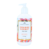 Orange Sorbet body wash bottle with colorful label on a white background. Available at Be Charmed
