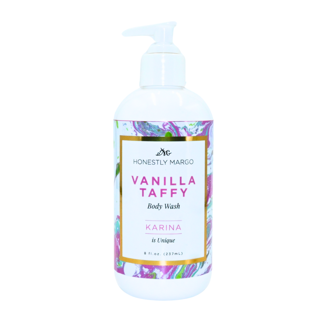 Body wash bottle with floral label on a white background. Available at Be Charmed