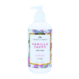 Body wash bottle with floral label on a white background. Available at Be Charmed