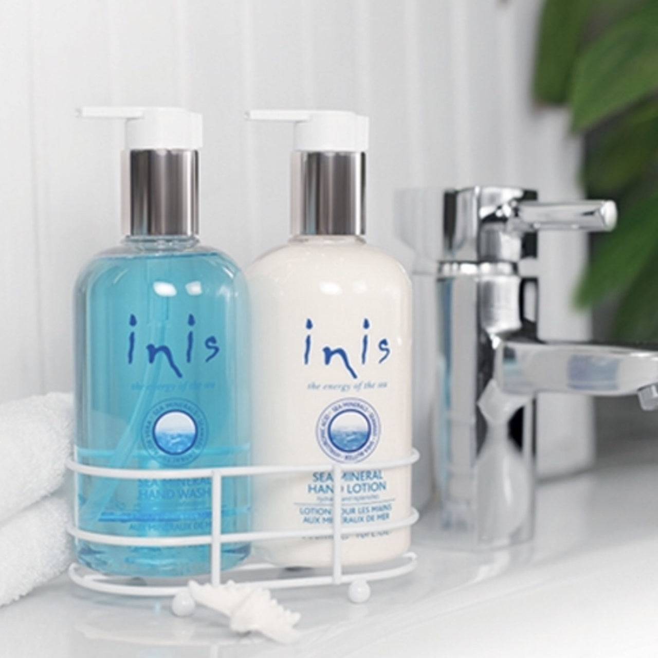Inis Energy of the Sea Hand Care Caddy  pictured on sink – hand care gift set with ocean-inspired lotion and wash. Available at Be Charmed.