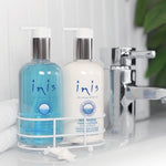 Inis Energy of the Sea Hand Care Caddy  pictured on sink – hand care gift set with ocean-inspired lotion and wash. Available at Be Charmed.