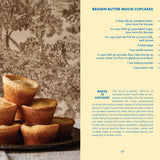 Brown butter mochi cupcakes with a recipe card on the right side.Available at Be Charmed