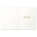 White card with gold text on a white background. Available at Be Charmed