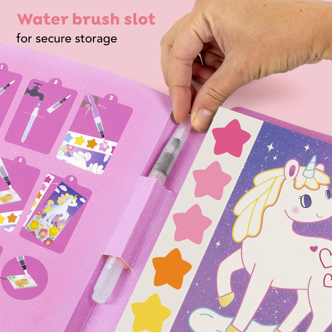 Inside of Tiger Tribe Paint a Picture Unicorn Skies art kit with watercolor paints, brush, and magical unicorn-themed painting scenes. Creative gift for kids. Available at Be Charmed.