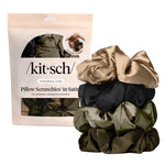 Kitsch pillow scrunchies in satin packaging on a white background. Available at Be Charmed