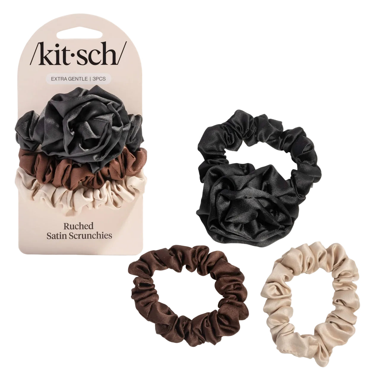 Set of three satin scrunchies in black, brown, and beige with packaging on a white background. Available at Be Charmed