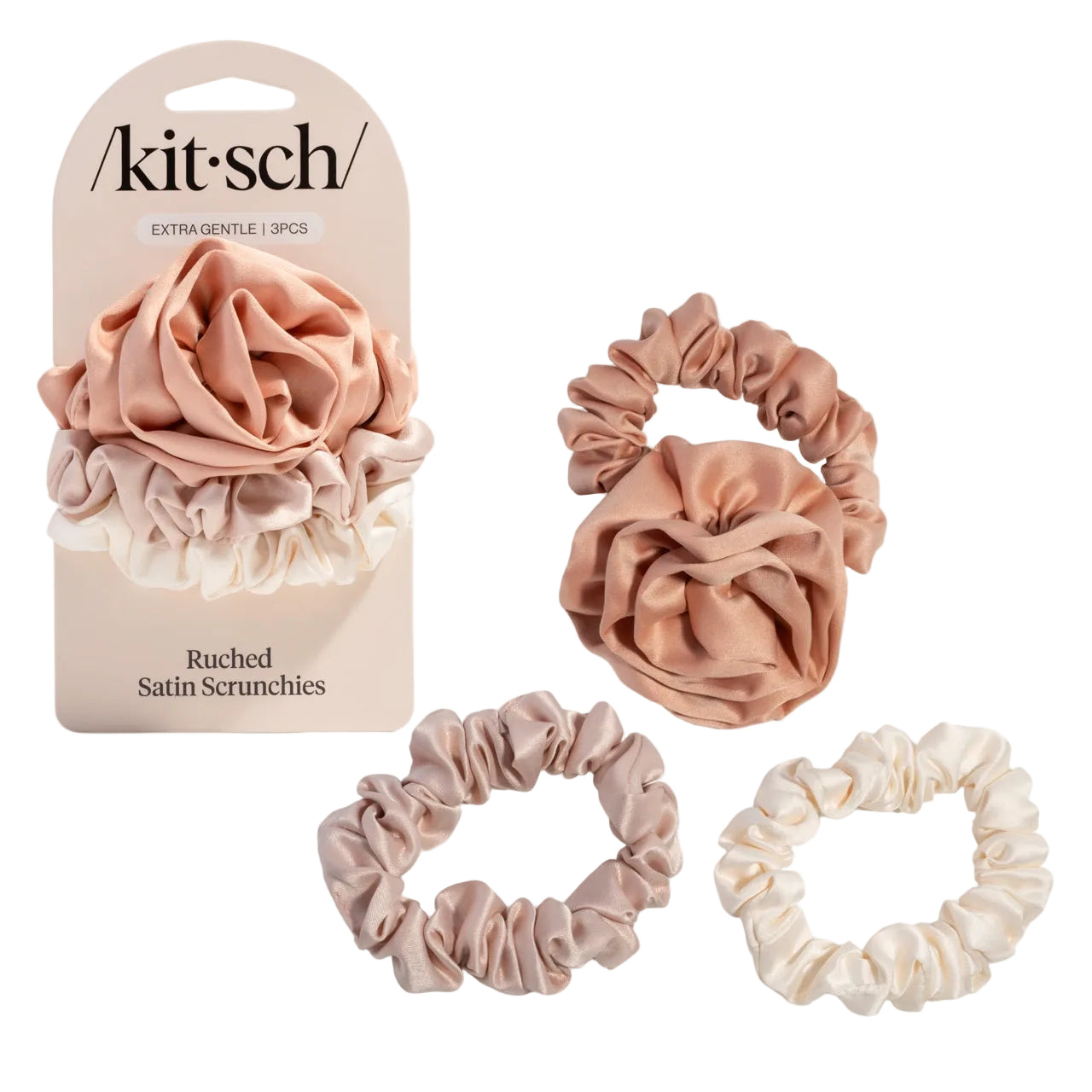 Set of satin teracotta scrunchies with packaging labeled 'kit-sch' on a white background. Available at Be Charmed