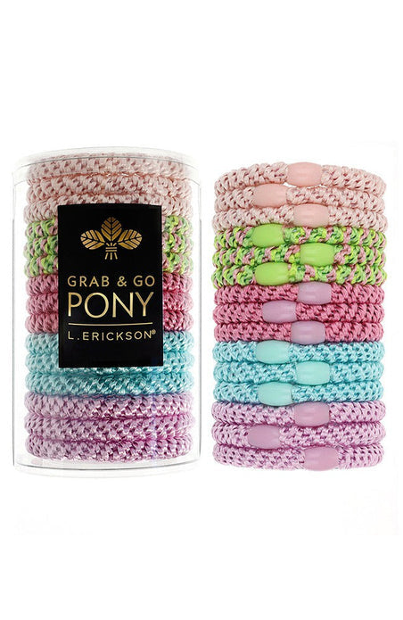 A clear tube containing Cabana ponytail holders with ornamental oval beads, labeled 'Grab & Go Pony' by L. Erickson.