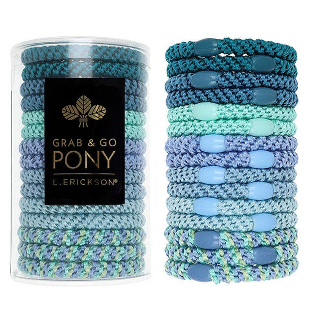 L. Erickson Grab & Go Pony Tube in Corsica. Set of 15 no-damage ponytail holders in coastal blues and sandy tones. Available at Be Charmed.