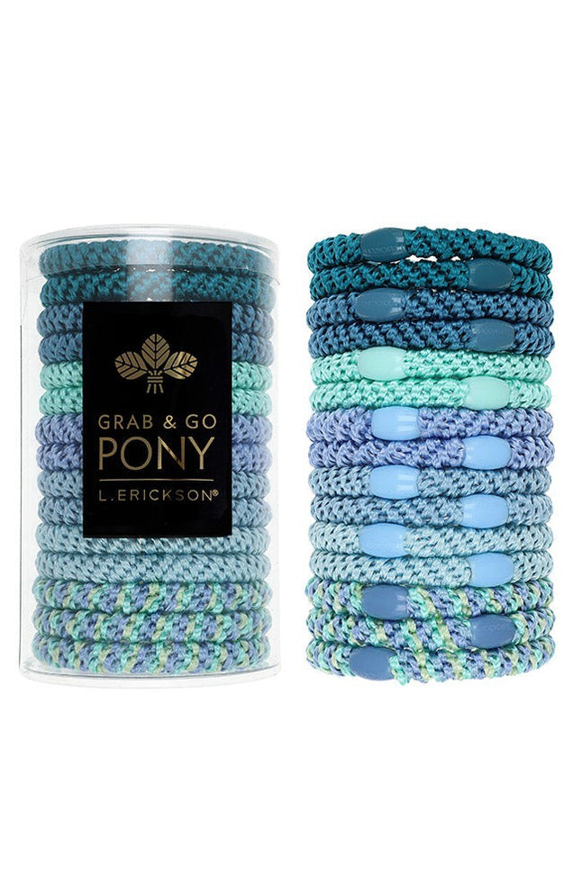 L. Erickson Grab & Go Pony Tube in Corsica. Set of 15 no-damage ponytail holders in coastal blues and sandy tones. Available at Be Charmed.