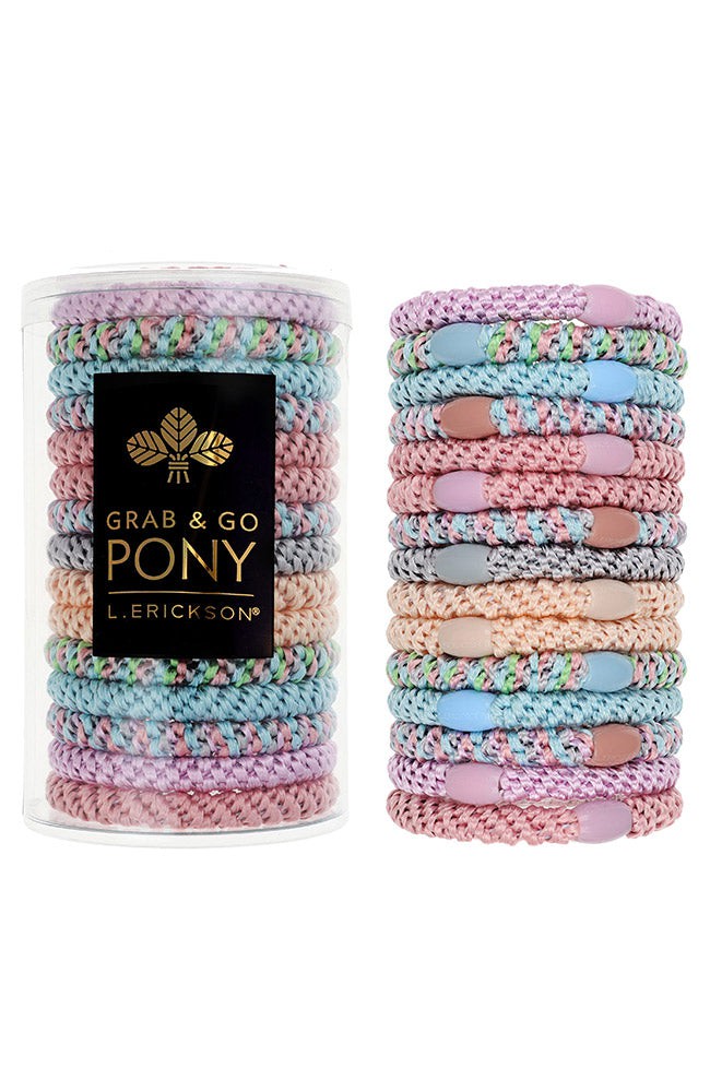 L. Erickson Grab & Go Pony Tube in Tutu. Set of 15 no-damage ponytail holders in soft pink and blush tones. Available at Be Charmed.
