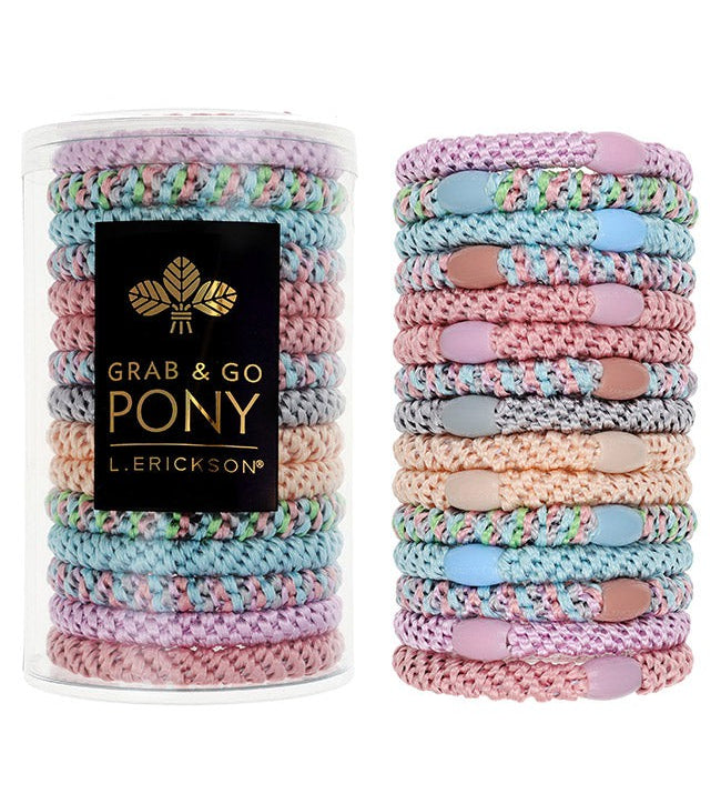 L. Erickson Grab & Go Pony Tube in Tutu. Set of 15 no-damage ponytail holders in soft pink and blush tones. Available at Be Charmed.