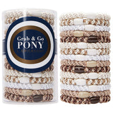 Packaged hair ties with 'Grab & Go Pony' label on a white background. Available at Be Charmed