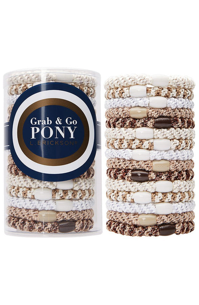 Packaged hair ties with 'Grab & Go Pony' label on a white background. Available at Be Charmed