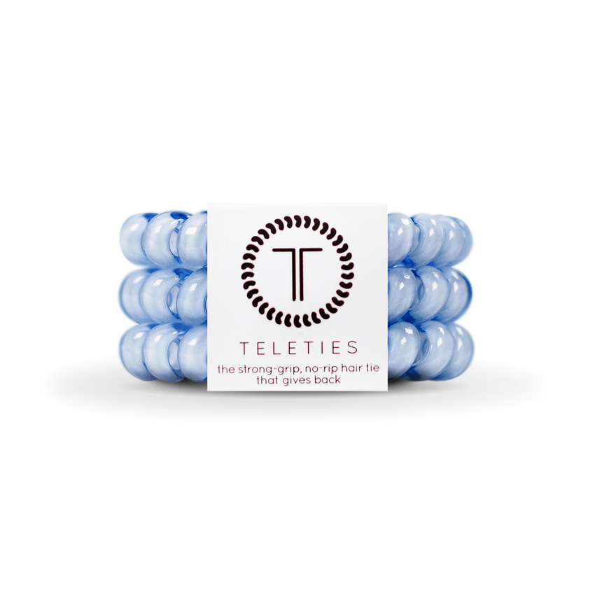 A pack of three Large washed denim hair ties with the brand logo 'T' on the packaging, indicating the product is from Teleties. Available at Be Charmed