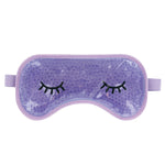A lavender gel eye mask with closed eye designs on the front, designed to be used hot or cold for soothing eye comfort. Available at Be Charmed