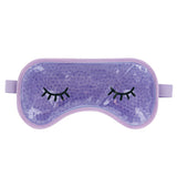 A lavender gel eye mask with closed eye designs on the front, designed to be used hot or cold for soothing eye comfort. Available at Be Charmed