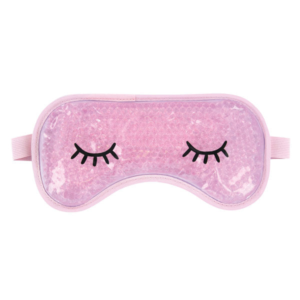 A pink gel eye mask with closed eye designs on the front, designed to be used hot or cold for soothing eye comfort. Available at Be Charmed