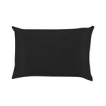 Charcoal satin pillow case on a white background. Available at Be Charmed