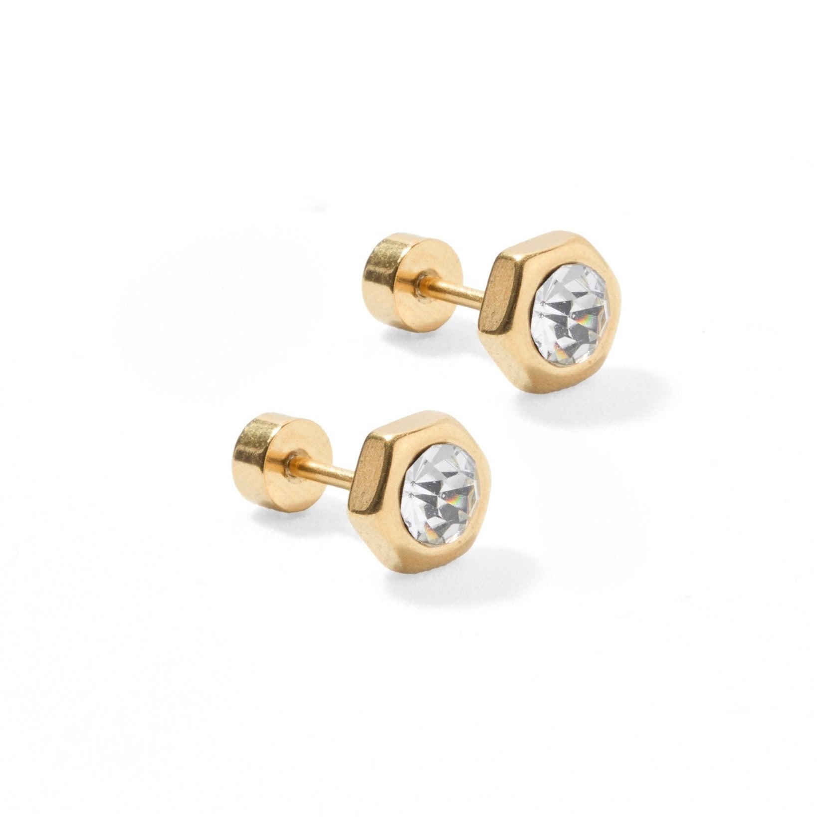 Pair of gold stud earrings with clear gemstones on a white background. Available at Be Charmed