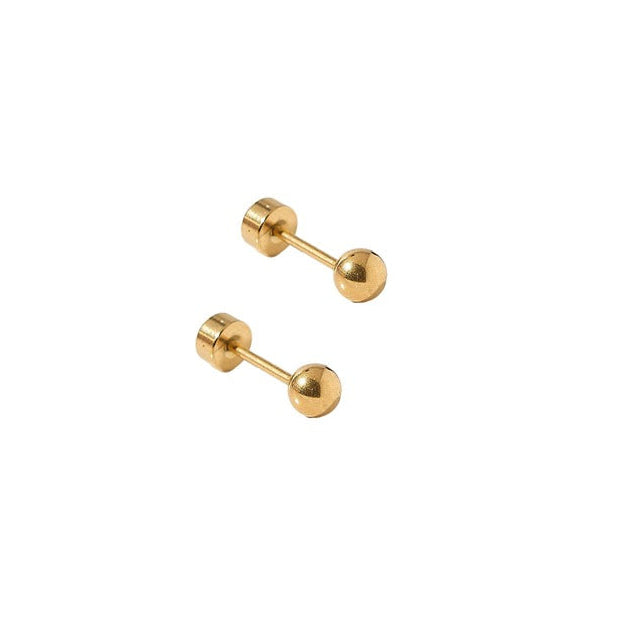 Pair of gold barbell earrings on a white background. Available at Be Charmed