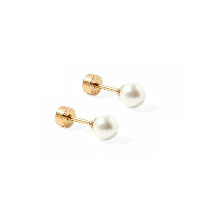 Pair of gold stud earrings with white pearls on a white background. Available at Be Charmed