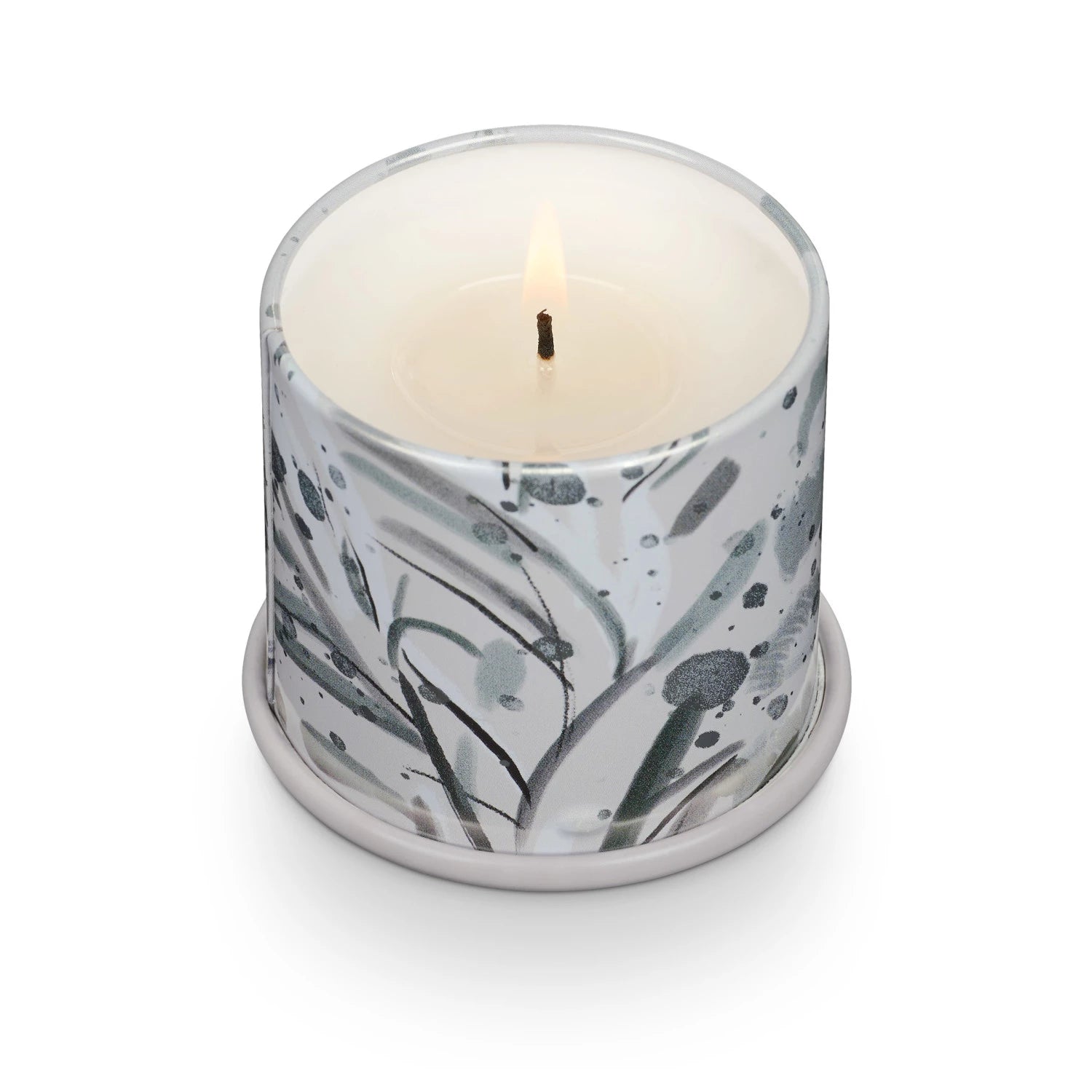 Candle in a decorative holder with a marble-like design on a white background. Available at Be Charmed
