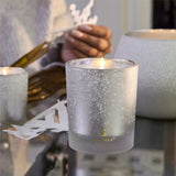 Lit Thymes Frasier Fir Flocked 6.5 oz Poured Candle with festive pine fragrance and decorative flocked design. Available at Be Charmed.