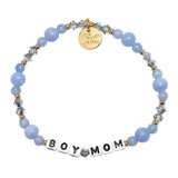 Bracelet with blue beads, silver and gold accents, and 'BOY MOM' charm on a white background. Available at Be Charmed