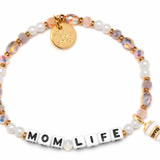 Bracelet with 'Mom Life' charm and multicolored beads on a white background. Available at Be Charmed