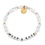 Bracelet with 'MOON & BACK' beads on a white background. Available at Be Charmed