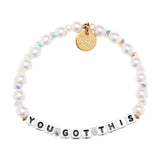 Pearl bracelet with beaded 'YOU GOT THIS' message and gold tag on a white background. Available at Be Charmed